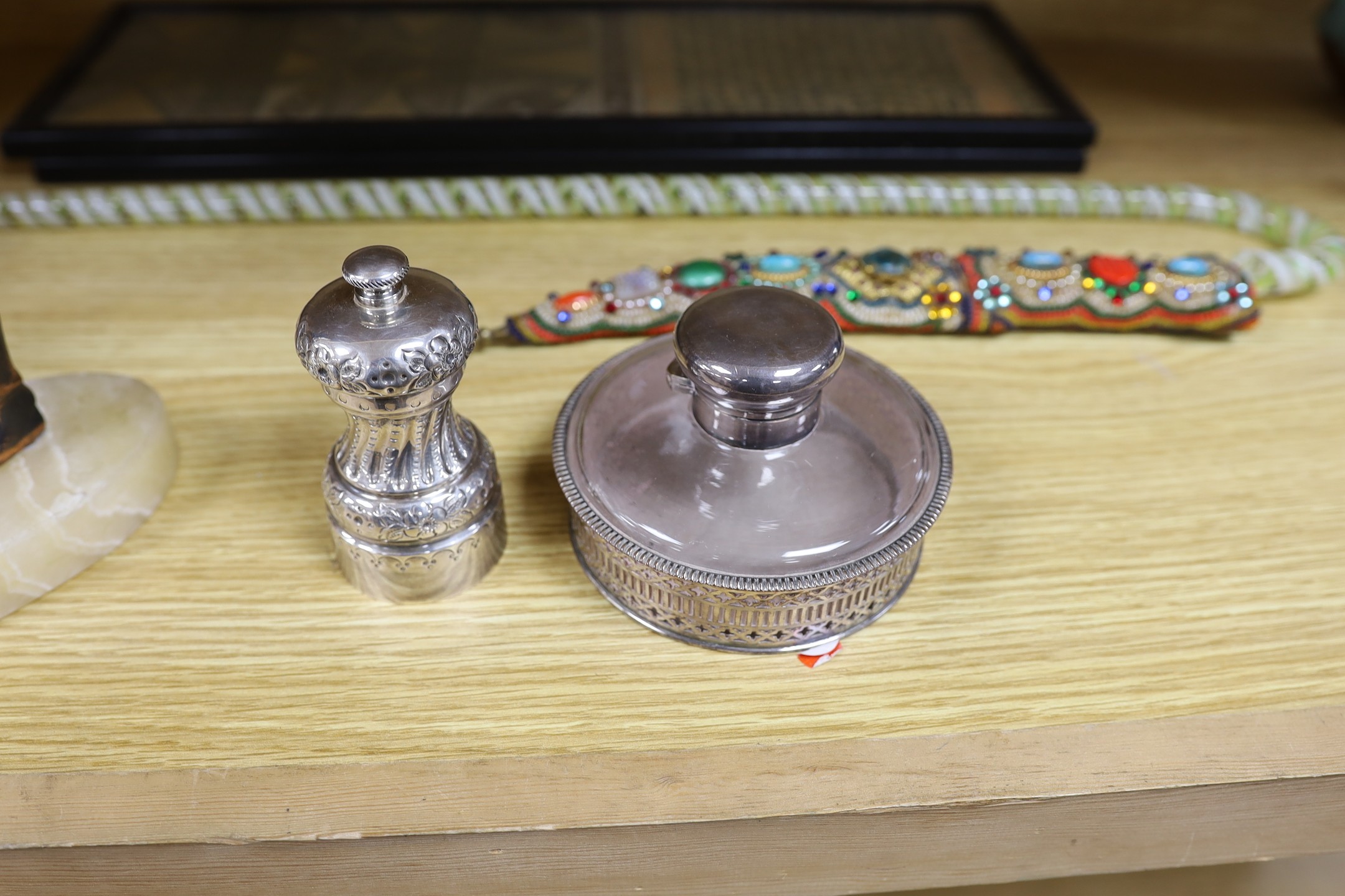 A miscellaneous selection of items, to include a Mappin and Webb Peugeot grinder, an Egyptian-style lady dancing on a plinth, a beaded dagger, etc.